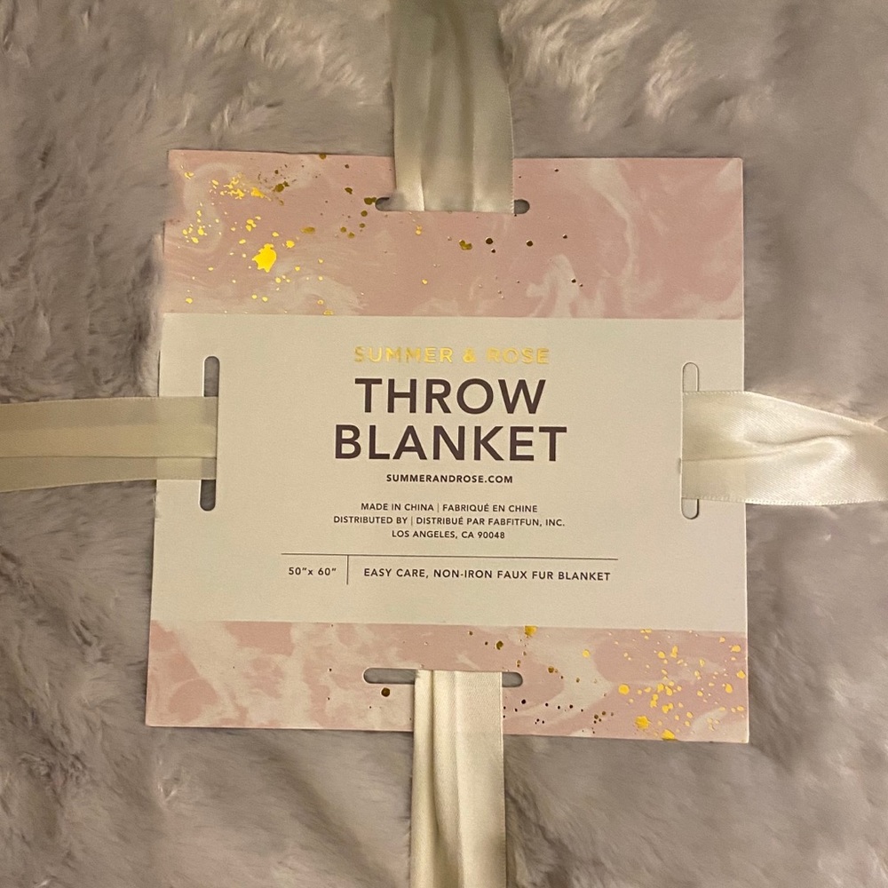 Summer & Rose faux fur throw blanket